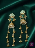 Antique gold finish long jhumka earrings with green stones, pearl detailing and dangling ghungroo chains, anti-tarnish artificial ethnic jewelry for women