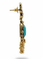 Vintage chandbali drop earrings with turquoise blue rectangular gemstone, antique gold finish, kundan stones, and small dangling gold beads on a white background.